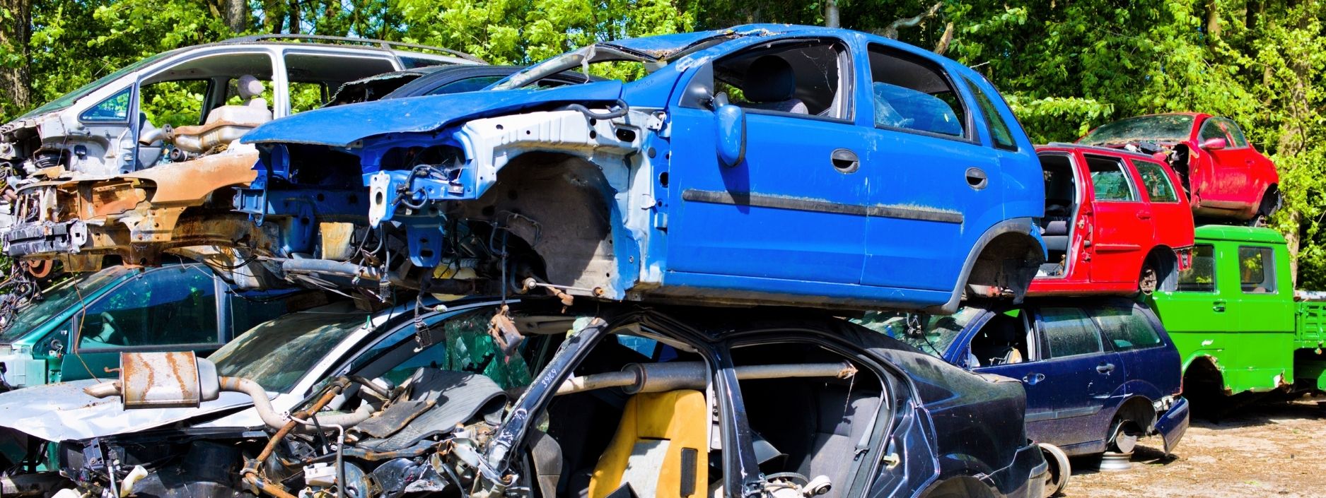 a car on a scrap heap